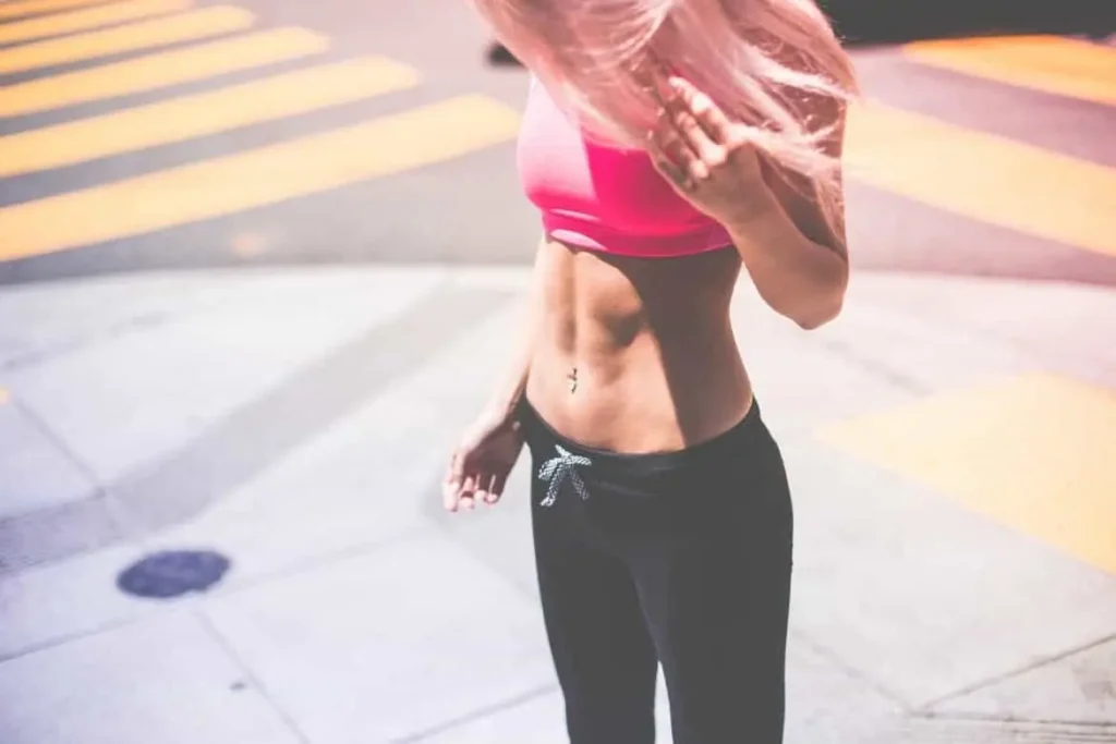 Woman with toned stomach after LA-EMS Body Sculpting Treatment Derbyshire